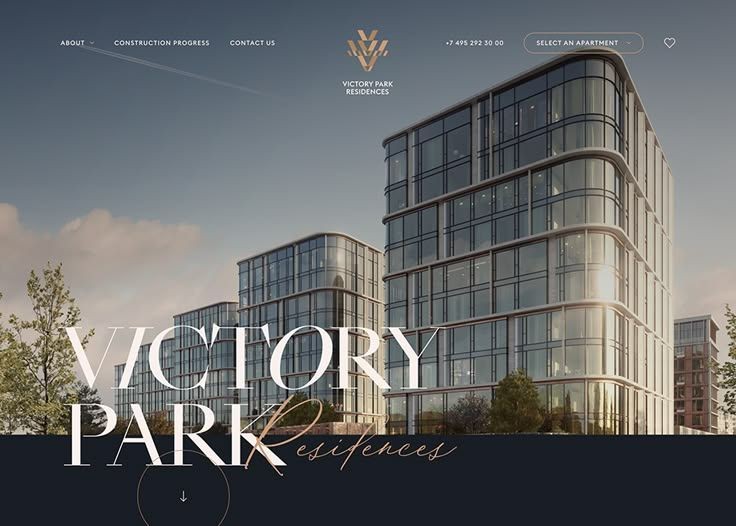 Modern glass buildings of Victory Park Residences with greenery, under a cloudy sky.